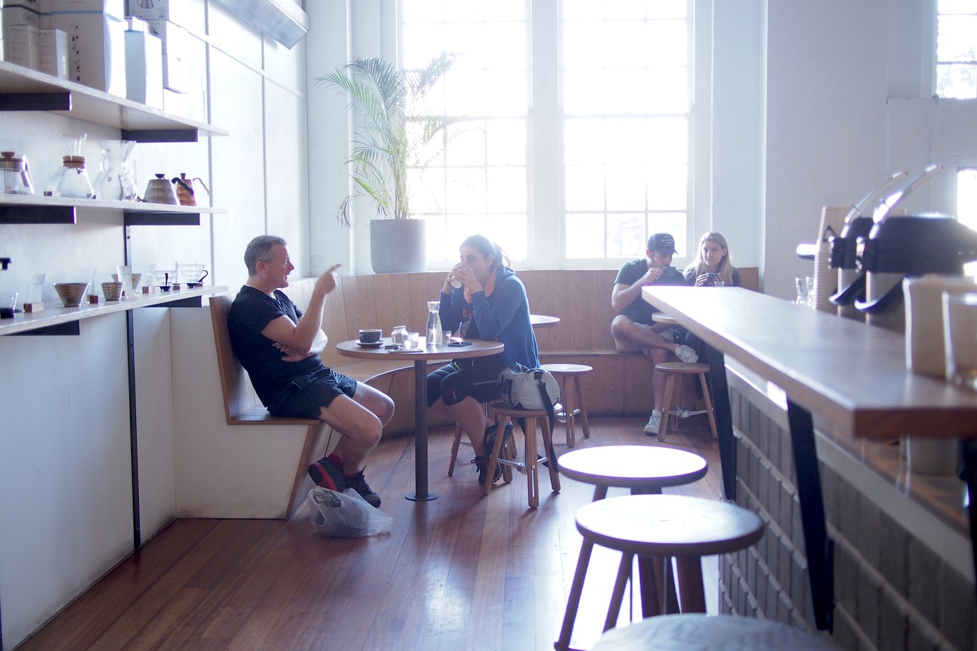 Bench and tables, and brew gear shelves, in Sample Coffee St Peters.