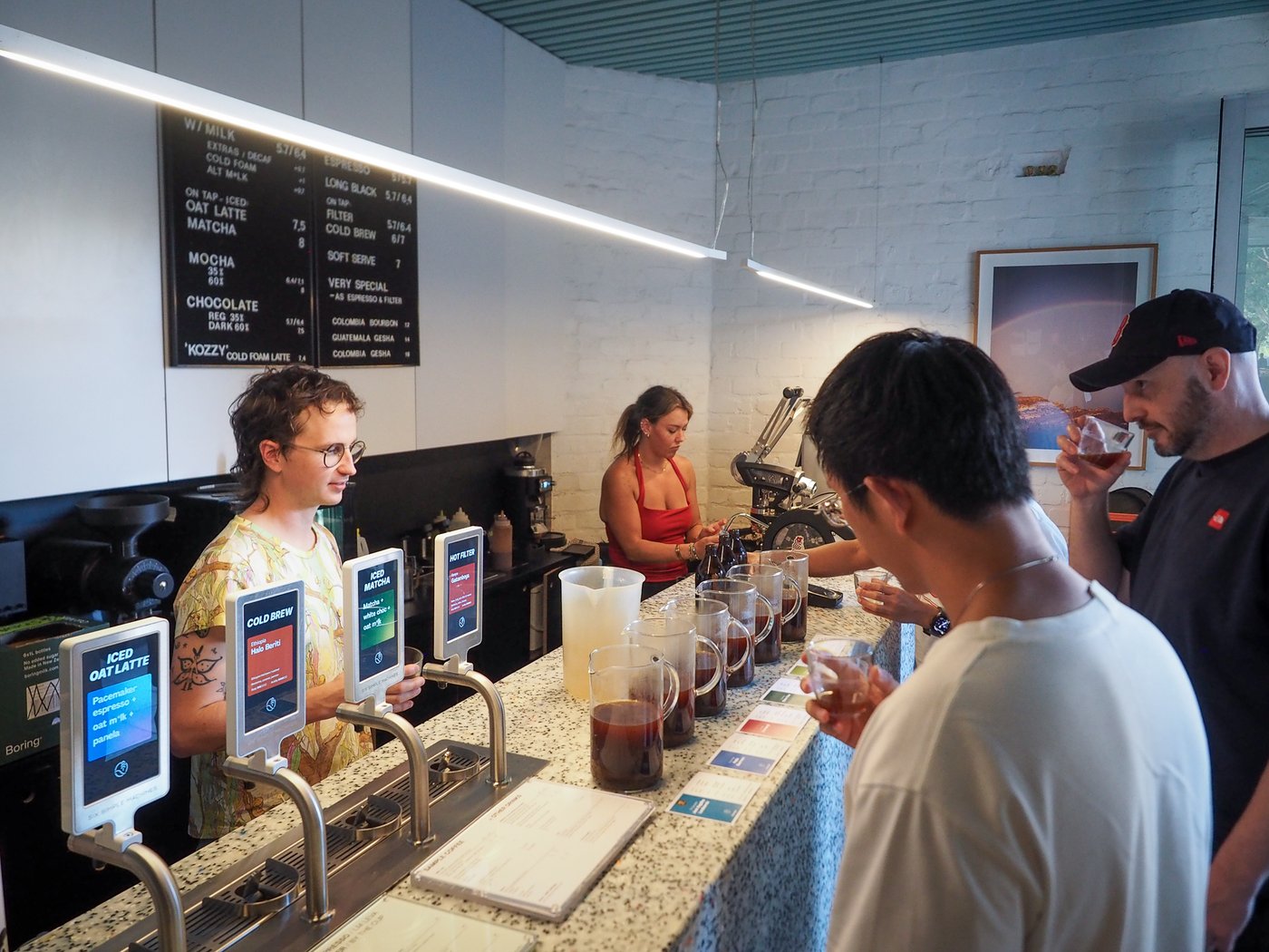 People gathering at one of our monthly coffee tasting sessions in Sample Coffee Surry Hills