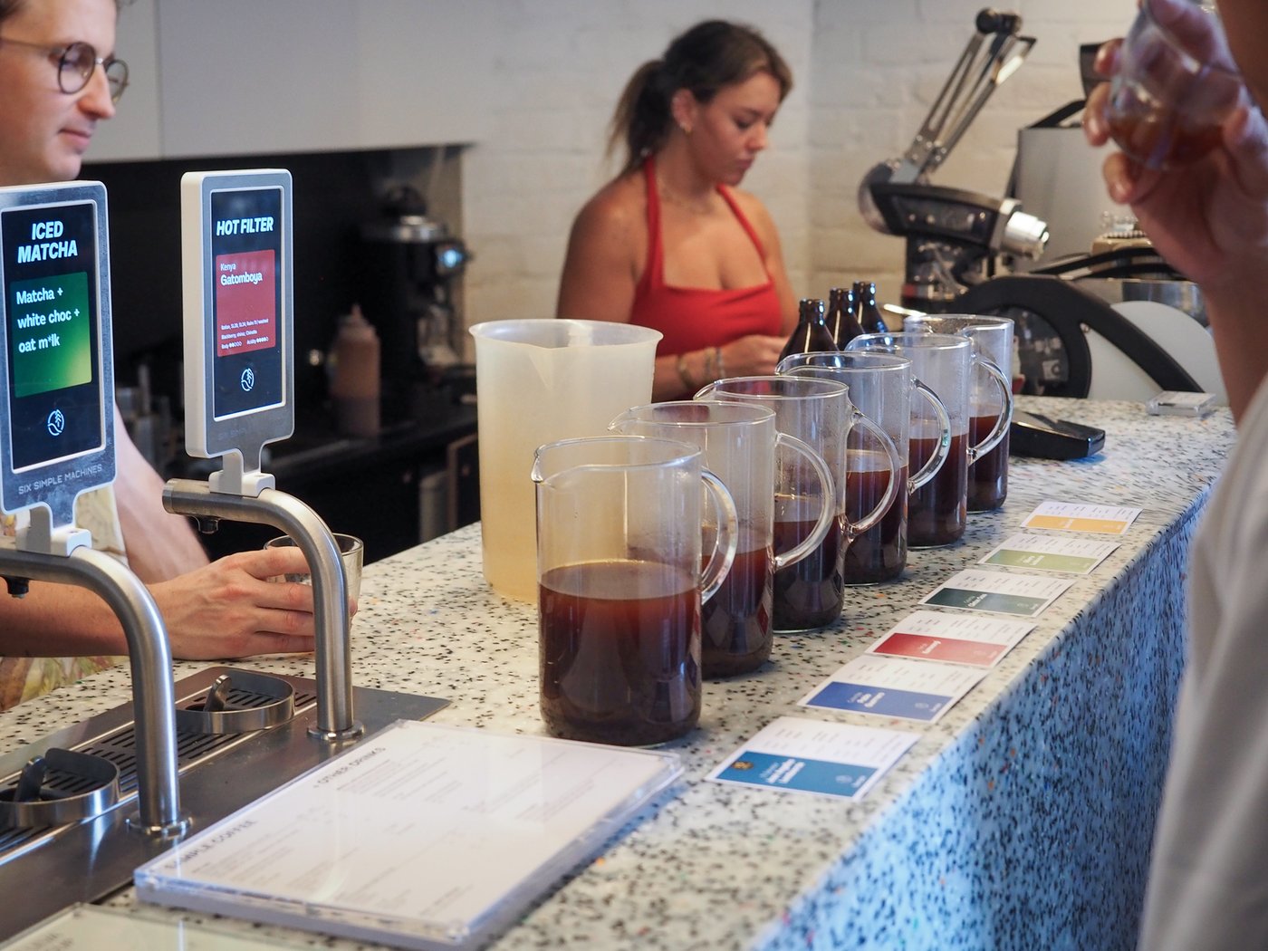 People tasting coffee at one of our Monthly Tasting Session in Surry Hills.