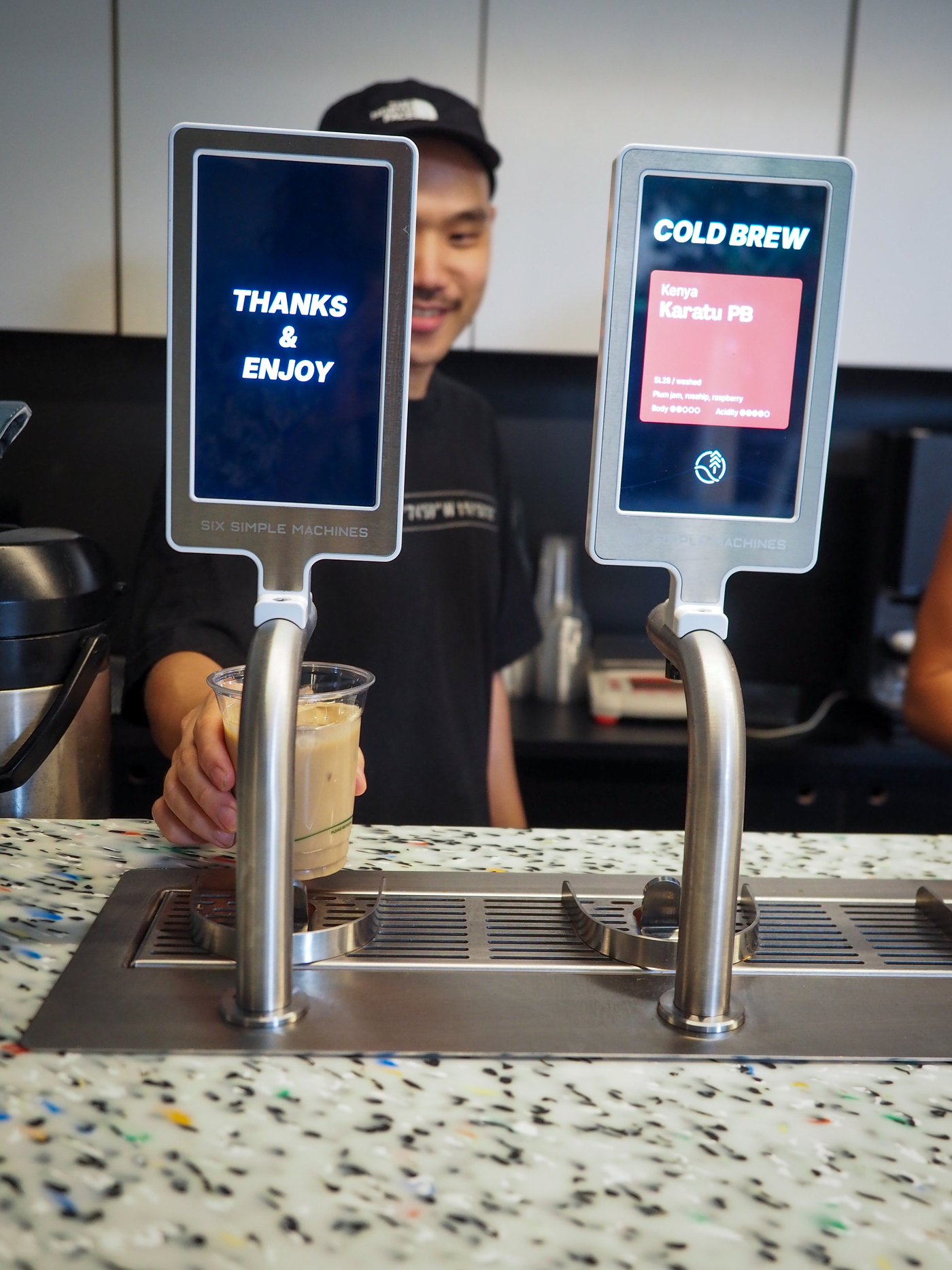 Indoor view of Sample Coffee Surry Hills - dispensing taps