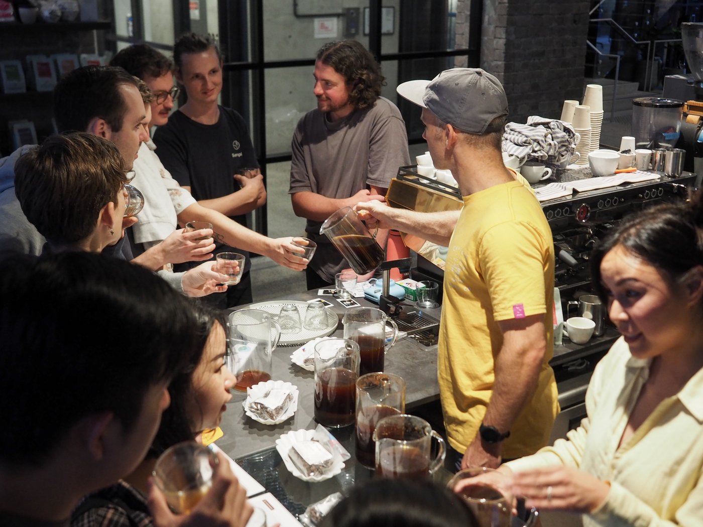 A photo of Reuben pouring coffee during our BEYOND event series at Old Gold Cafe, Chippendale.
