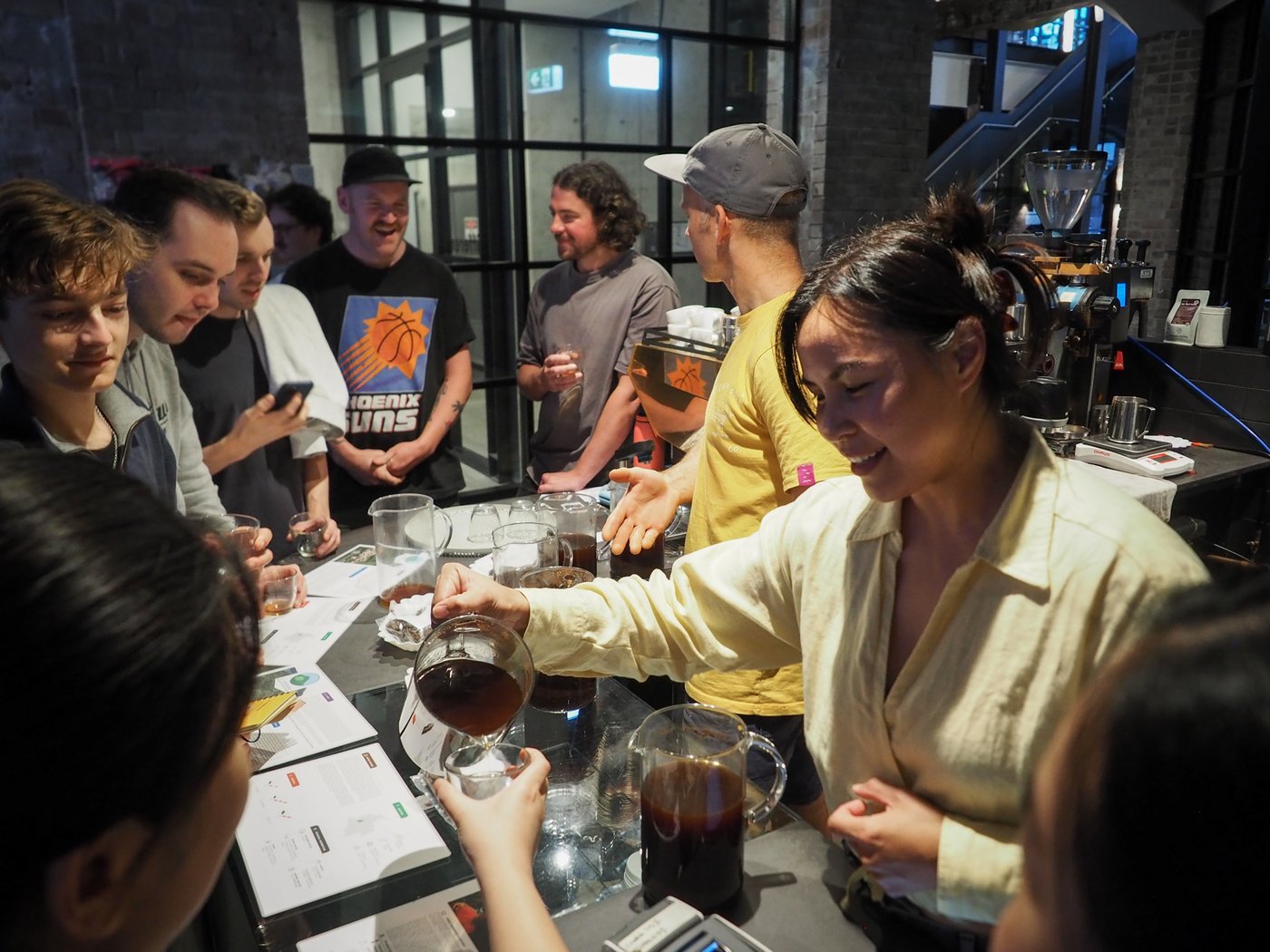 Reuben and a staff from Caravela team serving different coffees during an event at Old Gold, Chippendale.