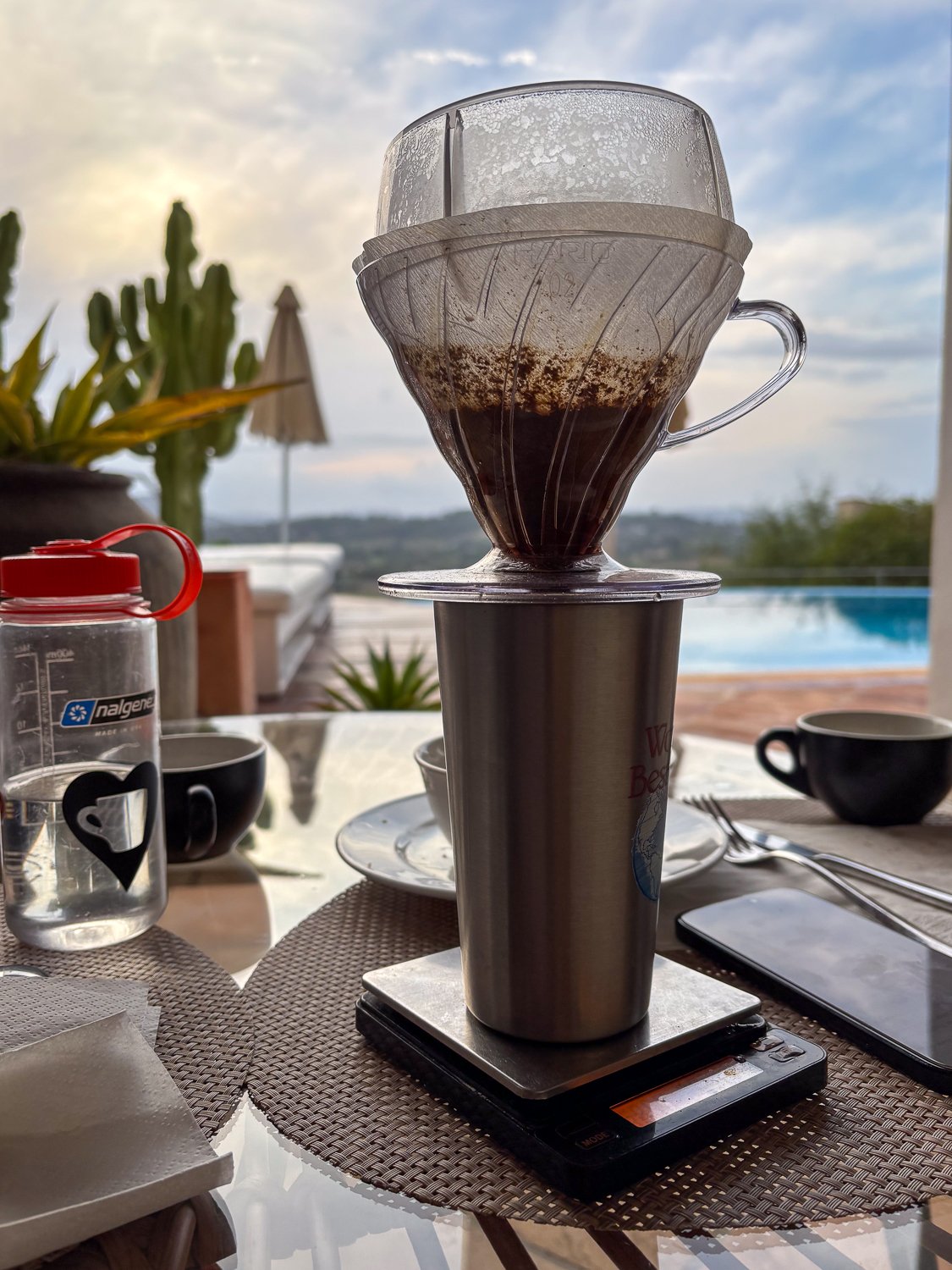Brewing a V60 with a drip assist in a hotel