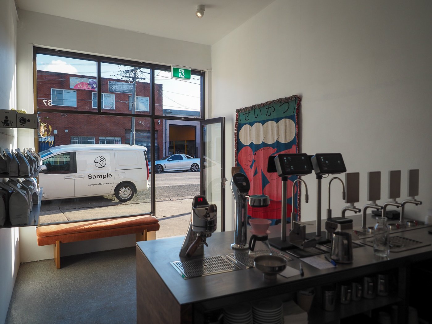A back view of the espresso bar of Sample Coffee Marrickville.