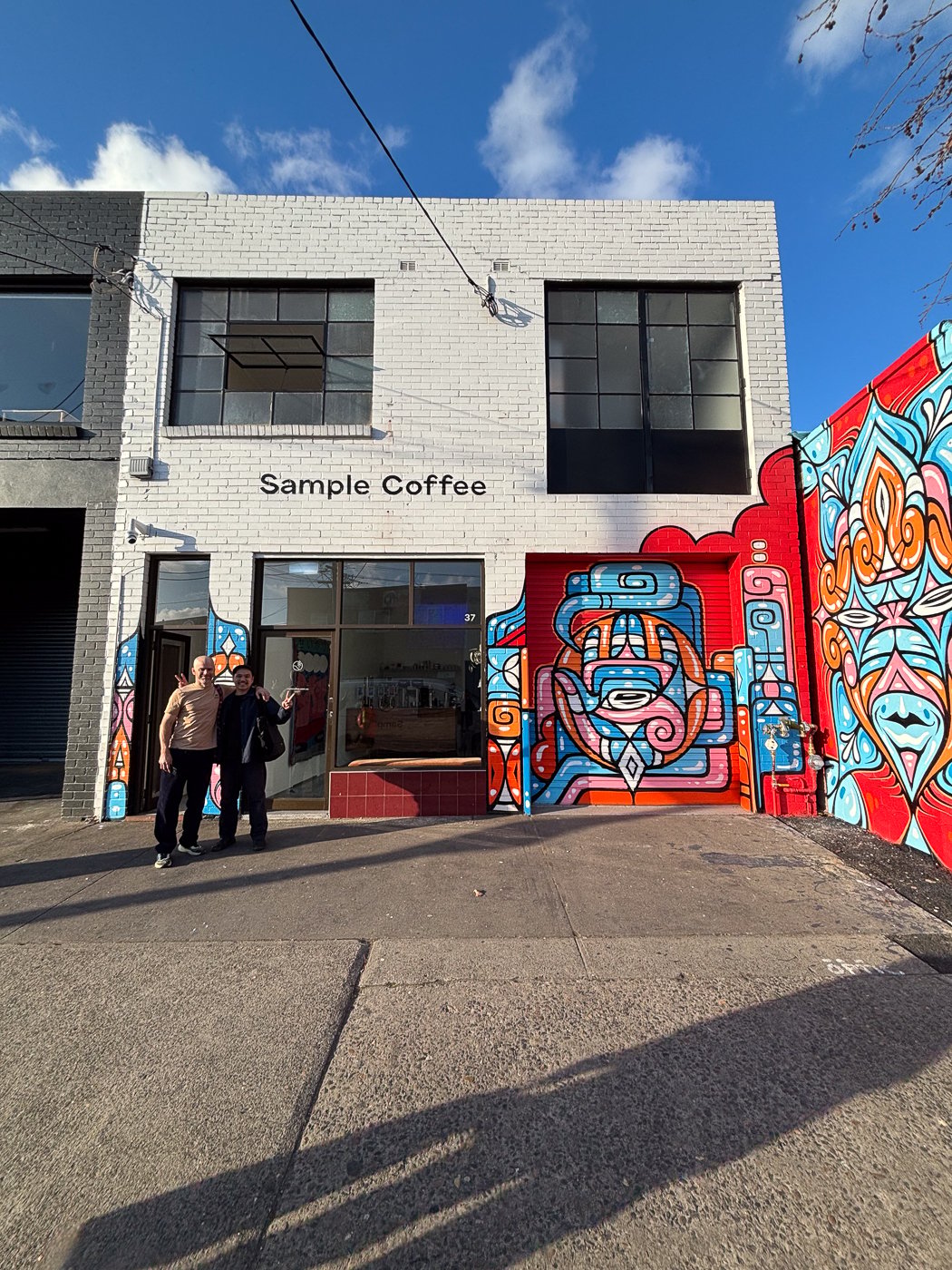 Reuben and Alvin in front of the Marrickville shop, after closing on the first day.