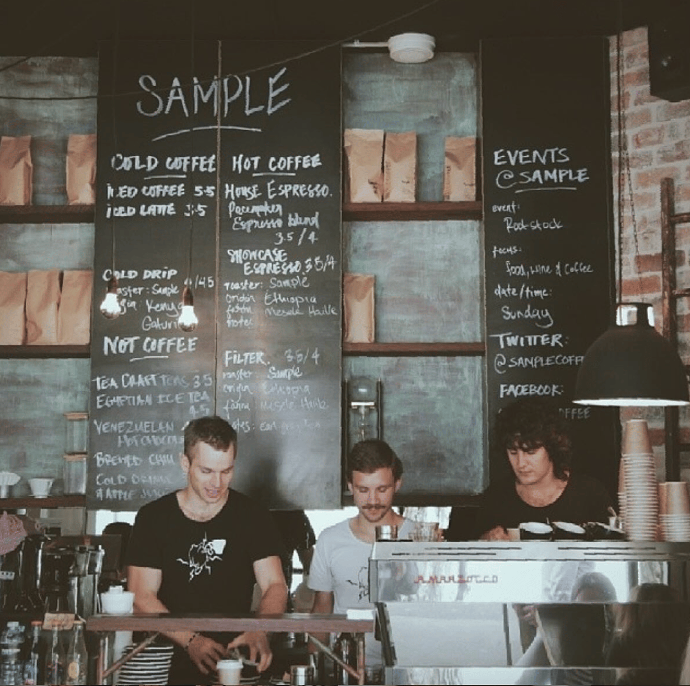 Reuben and two Sample Coffee staff behind the bar sometime in 2011-2013.