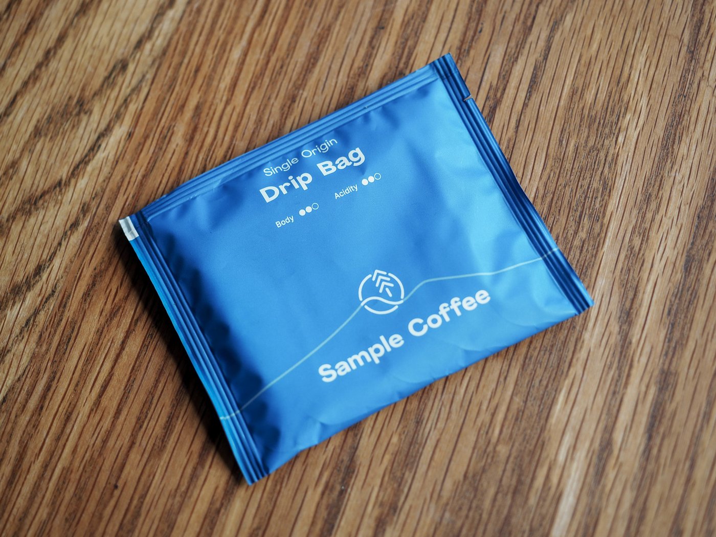 A Sample Coffee single origin drip bag sachet, closed.