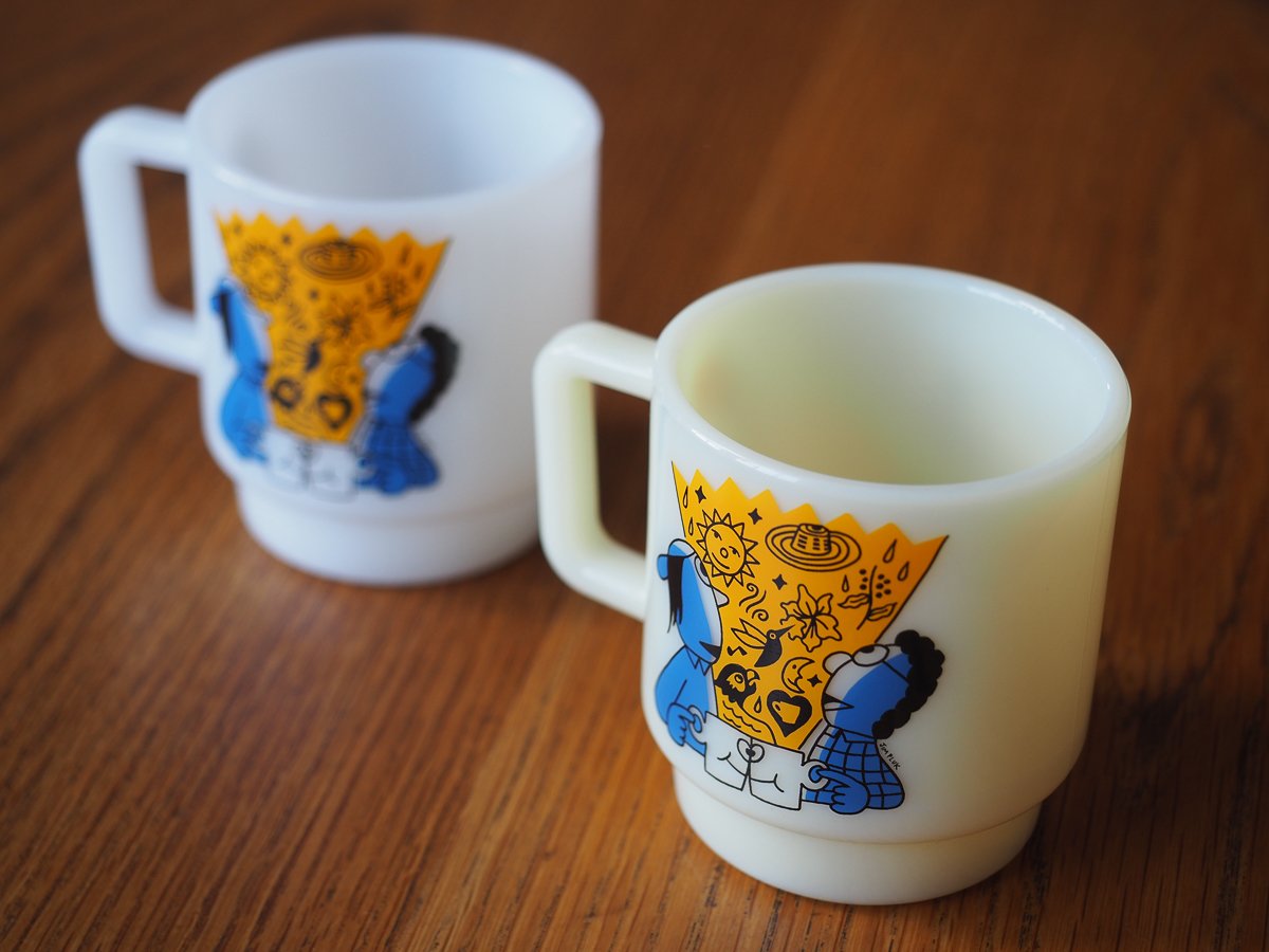 A pair of Sample Coffee x Jim Pluk mugs, view from above.